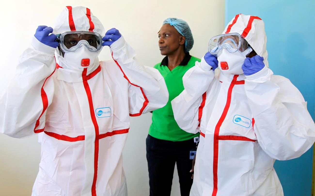 Kenyan nurses wear protective gear during a demonstration of preparations for any potential coronavirus cases at the Mbagathi Hospital, isolation centre for the disease, in Nairobi, Kenya March 6, 2020.