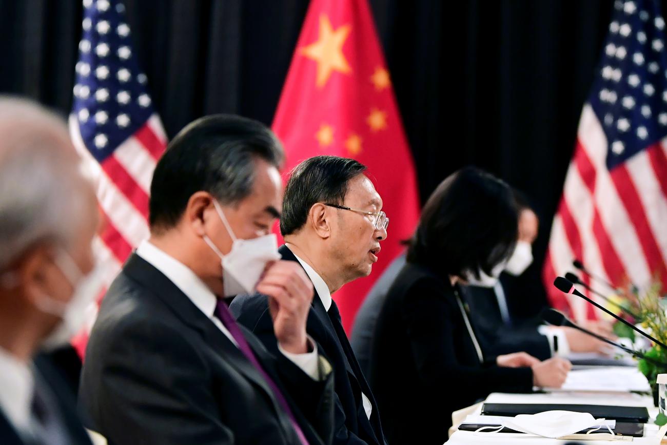 The Chinese delegation led by Yang Jiechi (C), director of the Central Foreign Affairs Commission Office and Wang Yi (2nd L), China's State Councilor and Foreign Minister, speak with their U.S. counterparts at the opening session of U.S.-China talks at the Captain Cook Hotel in Anchorage, Alaska, U.S. March 18, 2021. Photo by Frederic J. Brown/Pool via REUTERS