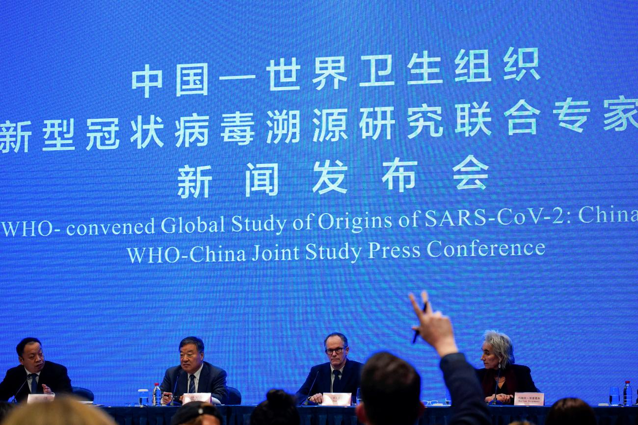 Panelists are seen at the WHO-China joint study news conference at a hotel in Wuhan, Hubei province, China, on February 9, 2021. 