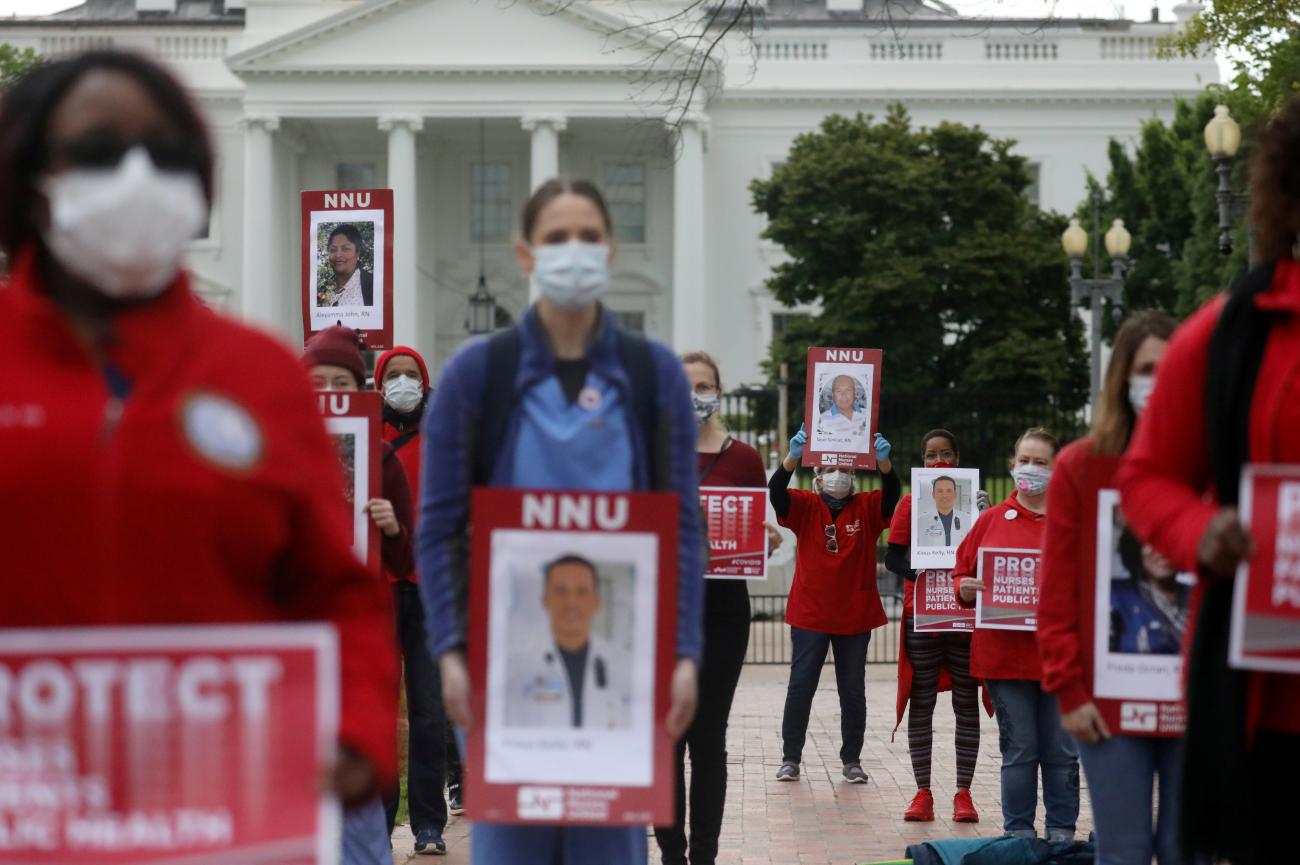 Nurses protested outside the White House on behalf of health-care workers who have become ill with COVID-19, calling on the Trump administration to mass production PPE, Washington, DC, April 2020. 