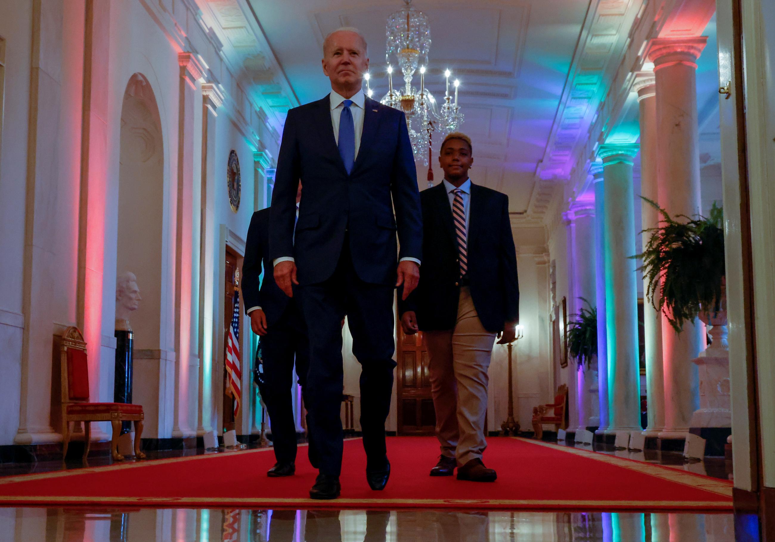 U.S. President Joe Biden and LGBTQ advocate Ashton Mota at the White House before delivering remarks commemorating LGBTQ+ Pride Month, in Washington, DC, on June 25, 2021.