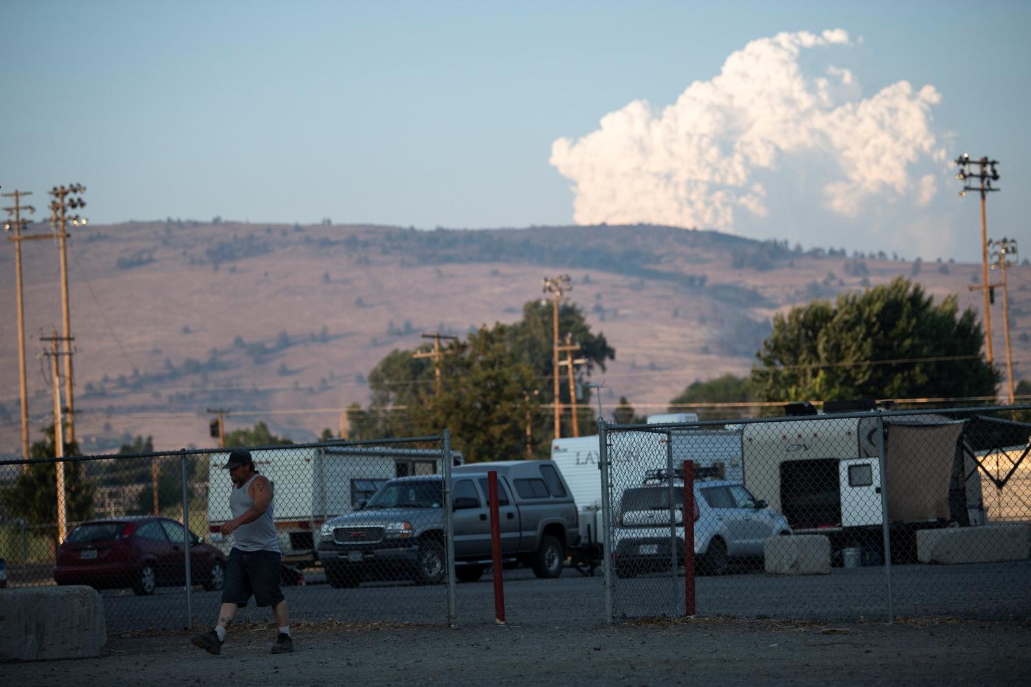 Bootleg Fire evacuees take shelter at a Red Cross evacuation center as extreme heat and wildfires continue in Klamath Falls, Oregon, on Ju