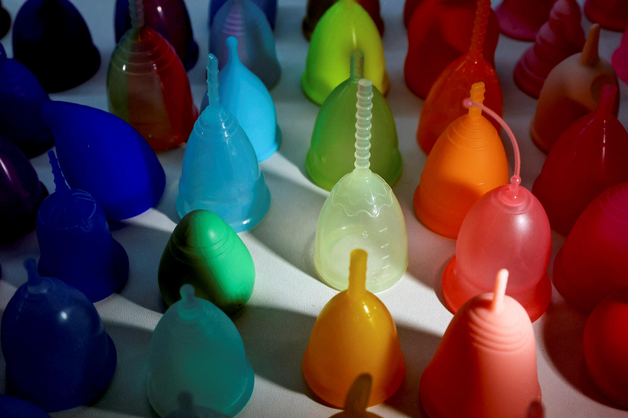 A rainbow color collection of mooncup menstrual cups at the GoMoond Period Party, the first menstruation-themed event in Taipei, Taiwan, on May 28, 2022. 
