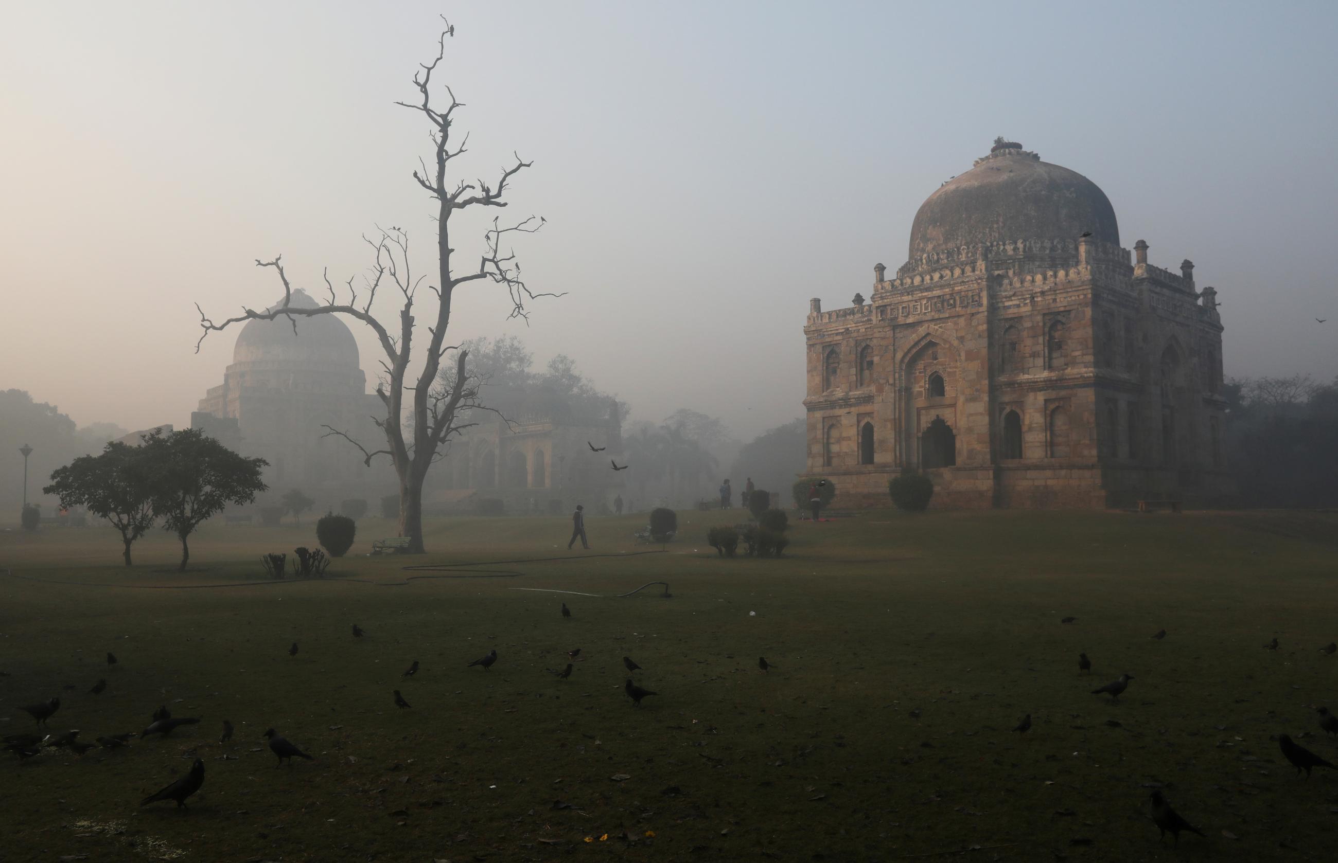 A view of Sheesh Gumbad at Lodhi Garden on a smoggy morning in New Delhi, India, on December 23, 2020. 