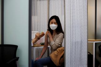 A health worker gets a dose of the Pfizer-BioNTech coronavirus disease (COVID-19) vaccine at a COVID-19 vaccination center in Seoul, South Korea, March 10, 2021.