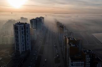 A general view shows Yekaterinburg city blanketed by smog from peat fire, Russia October 15, 2021.