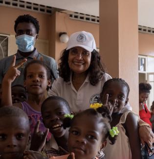 Marie Marcelle Deschamps is seen with a group of children in Haiti, in 2021.