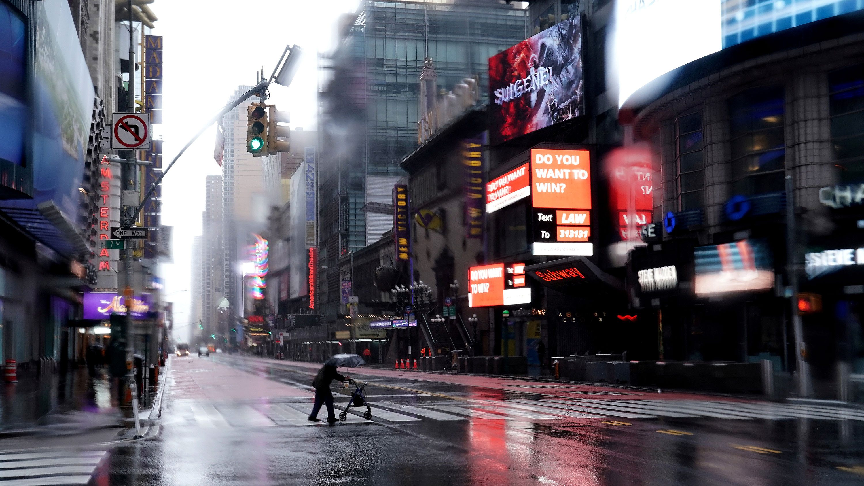 This is a striking photo of Times Square—New York in the Rain—as it's rarely been seen before: completely empty of cars and people.