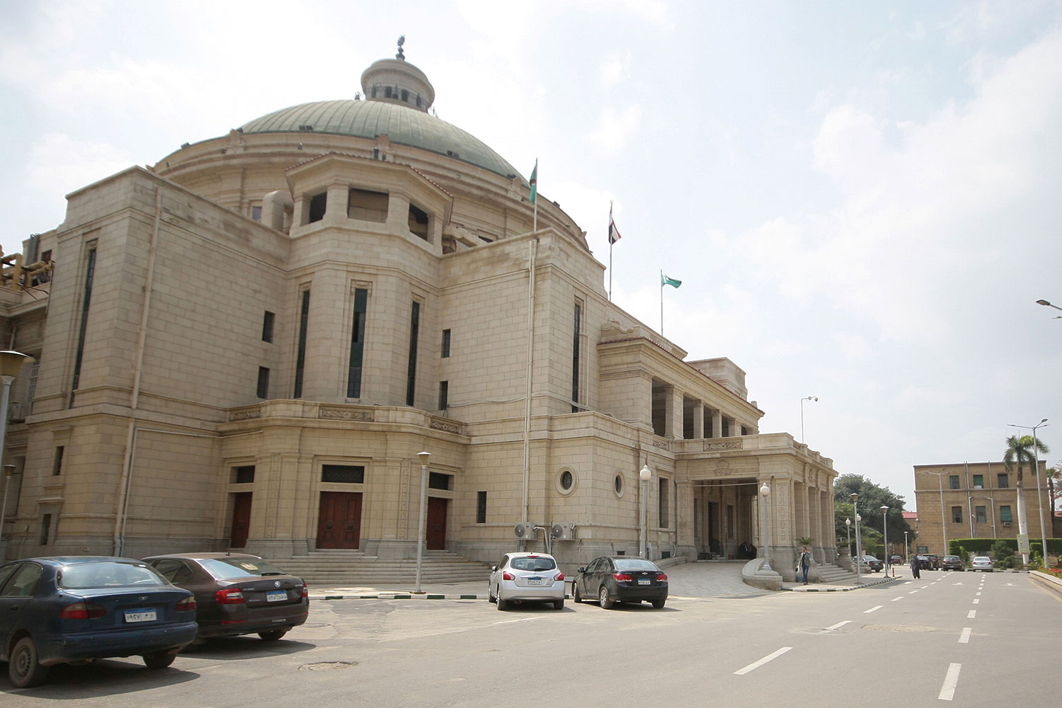 Picture shows architecturally iconic buildings and the abandoned street in front of them.