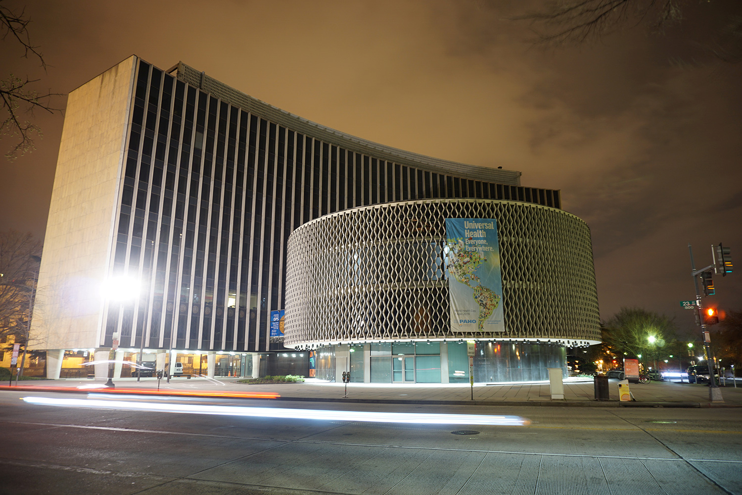 Picture shows the large building at night with the eerie light produced by a long exposure with an SLR camera.