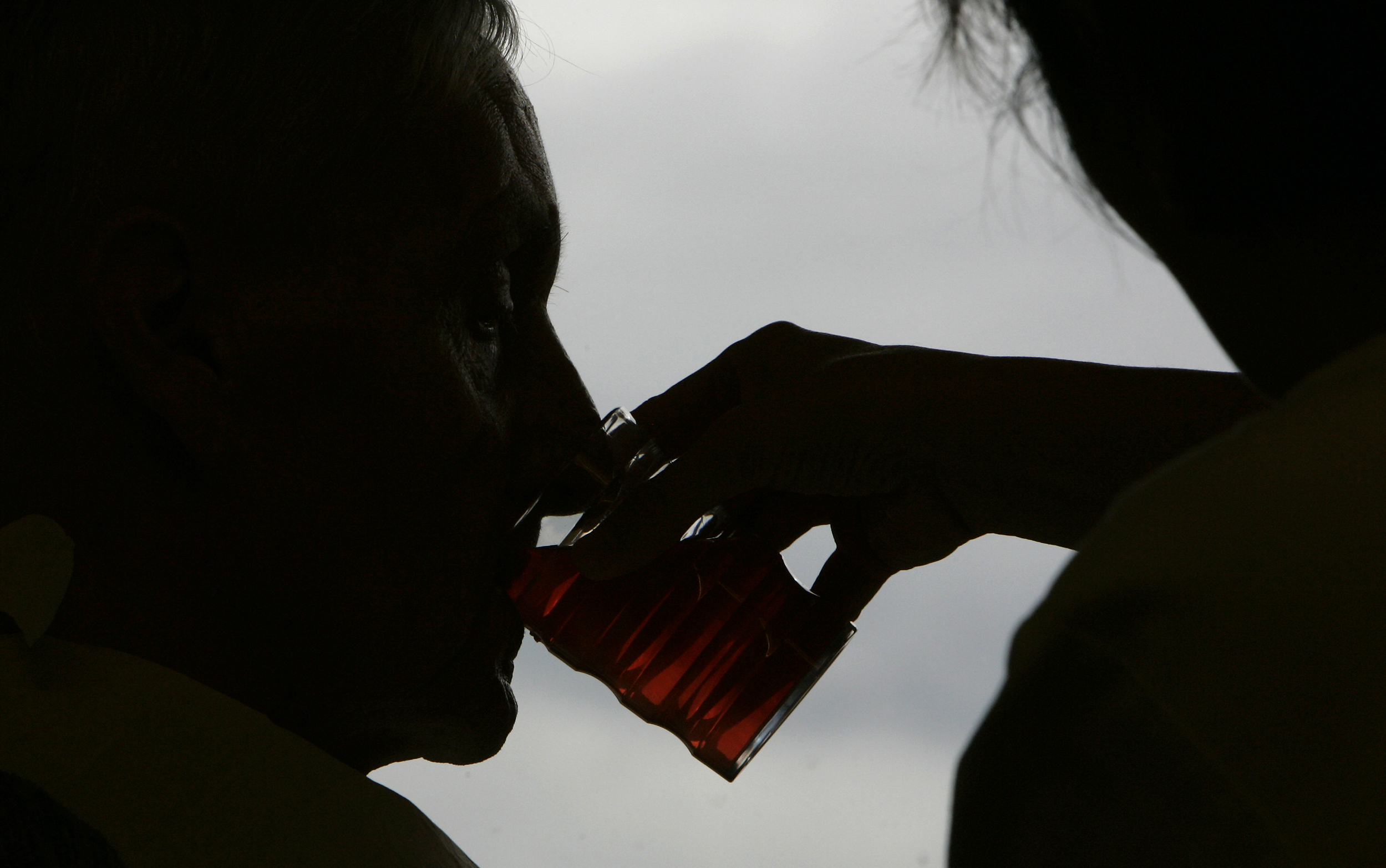 A care nurse helps a pensioner during lunch in a residential home for the elderly in Emmenbruecke near Lucerne December 7, 2007.