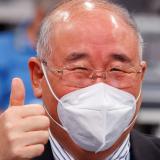 China's chief climate negotiator, Xie Zhenhua gives a thumbs up at aa COP26 meeting