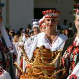 Women dressed in Belarussian national clothes celebrate harvest festival in Volkovysk, some 220 km west of Minsk, September 17, 2004.