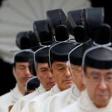 Japanese Shinto priests attend a ritual during an autumn festival at Yasukuni Shrine in Tokyo, Japan October 17, 2017. Formerly a harvest festival, Japan's Labor Thanksgiving Day is celebrated to honor labor, production, and for citizens to give each other thanks.