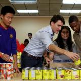 Canadian Prime Minister Justin Trudeau and Toronto Raptors President Masai Ujiri take part in a Thanksgiving food drive in Toronto, Ontario, Canada, on October 13, 2019.