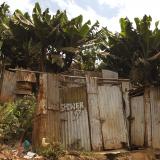 A public toilet constructed of rusty sheets of metal stands in Gatwekera Village in the Kibera slum, in Nairobi, Kenya, on October 12, 2015. 