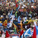 Crowds demonstrate in the streets in Glasgow, Scotland, on November 6, 2021.