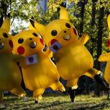 People dressed as Pikachu—a character from Pokémon—protest against the funding of coal by Japan, near the COP26 conference venue in Glasgow, on November 4, 2021.