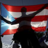 People protesting for improved health benefits in San Juan, the capital of Puerto Rico, and its largest city.