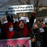 Afghan women shout slogans during a rally to protest against what the protesters say is Taliban restrictions on wome