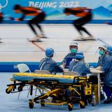 Medical staff in personal protective equipment are seen at a speed skating training session for the Beijing 2022 Winter Olympics in Beijing, China, January 28, 2022