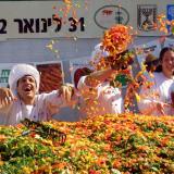 Israeli chefs celebrate after preparing a giant salad setting a new world record in the southern Israeli town of Araba January 31, 2002.