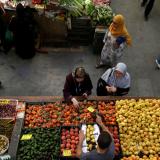 DOCUMENT DATE:  November 21, 2017  People buy vegetables and fruits in a market in Algiers, Algeria October 15, 2017. 