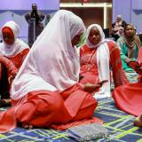The Alis, an immigrant family from Kenya, gather with the Muslim community at Kentucky International Convention Center to celebrate the Eid al-Adha festival, in Louisville, Kentucky, on July 9, 2022. 