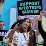 Pauline Muchina, of American Friends Service Committee, and activists call on the EU to end opposition to a COVID-19 waiver of WTO intellectual property barriers, in Washington, DC, June 24, 2021. 