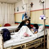 Noa, a 10-year-old Israeli girl suffering from Long Covid, chats with her mother in a post-coronavirus disease (COVID-19) clinic in Schneider Children's Medical Center, in Petah Tikva, Israel December 6, 2021. 