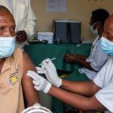 A syringe and a vial with vaccine against COVID-19 are seen at the Masaka hospital in Kigali, Rwanda, on March 5, 2021.