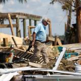 A resident of Keaton Beach works to recover their belongings from their home after Hurricane Helene passed through the Florida panhandle.