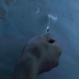 A researcher handles samples, December 2024.