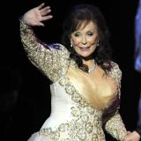 Country legend Loretta Lynn waves after performing during the "Grammy Salute to Country Music honoring Loretta Lynn" in Nashville, Tennessee, October 12, 2010.