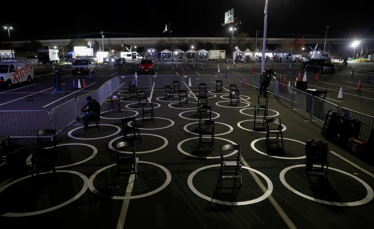 Chairs sit in social distancing circles because of the coronavirus disease (COVID-19) pandemic awaiting the arrival of attendees at U.S. Democratic presidential nominee Joe Biden's 2020 U.S. presidential election night rally in Wilmington, Delaware, U.S., November 3, 2020.