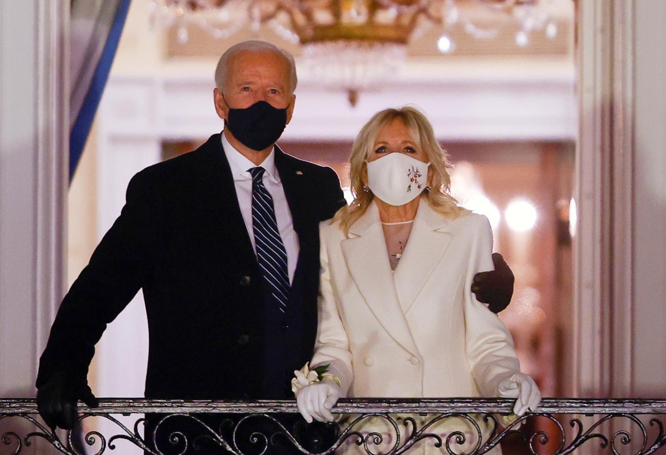 President Joe Biden and first lady Jill Biden watch fireworks from the White House after his inauguration as the 46th President of the United States