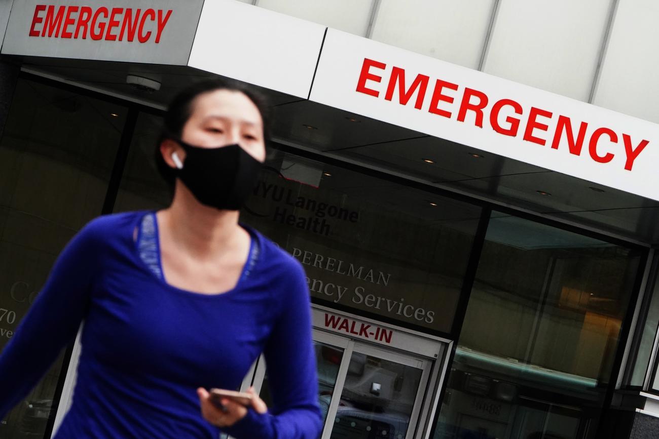 A woman walks away from a hospital emergency department amid the coronavirus disease (COVID-19) pandemic in the Manhattan borough of New York City, New York, U.S., December 24, 2020.