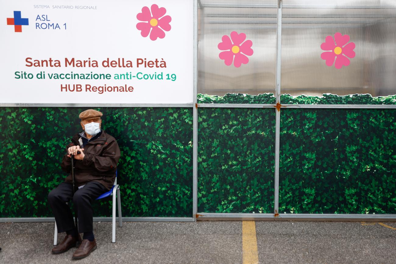 A man waits to receive a dose of the Pfizer-BioNTech coronavirus disease (COVID-19) vaccine as part of the coronavirus vaccination campaign, while the country sees surge in COVID-19 infections, in Rome, Italy, March 5, 2021.