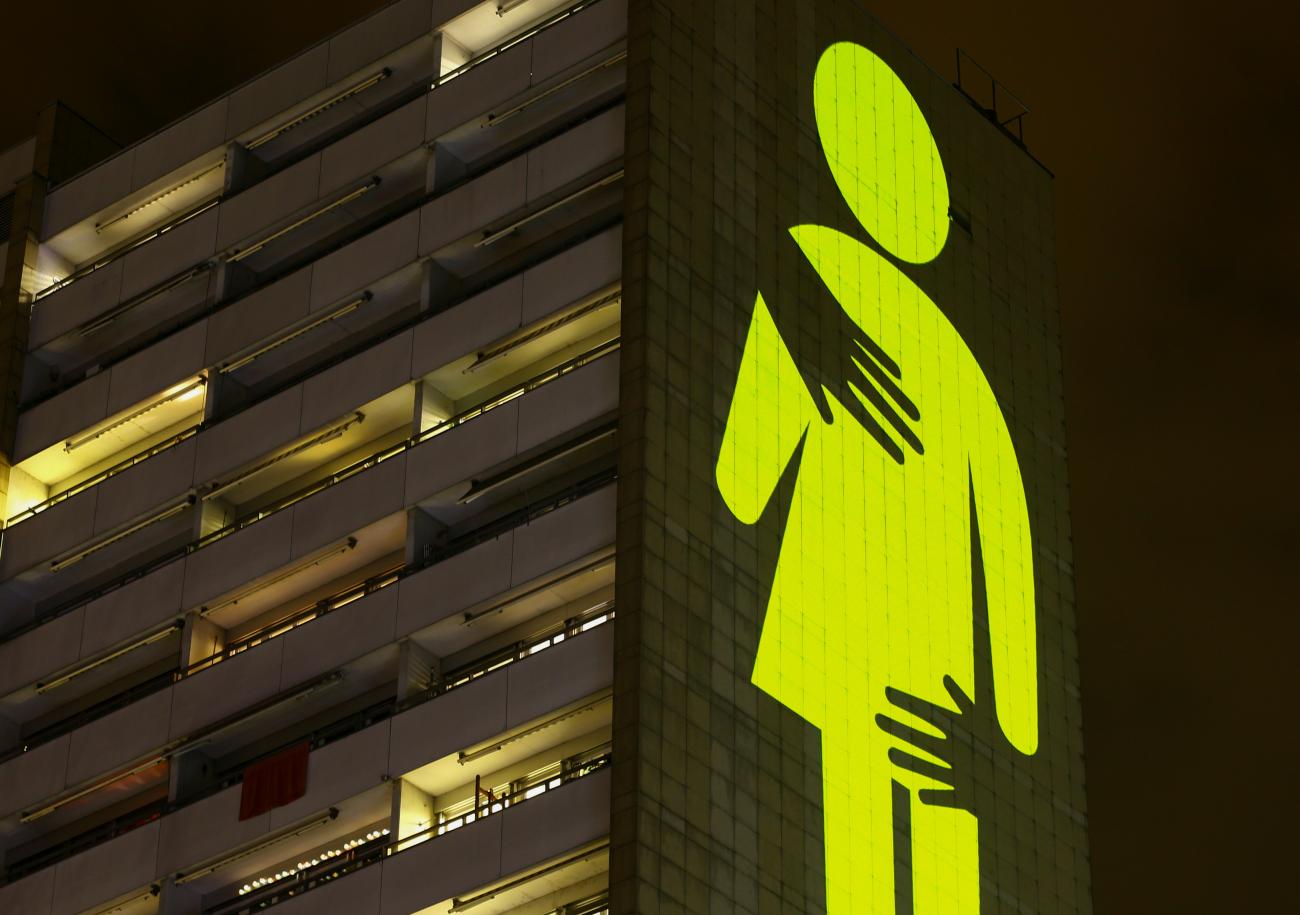 On International Women's Day, a light projection on the Lochergut residential building is visible during a protest by Amnesty International's women's rights group against sexual violence, in Zurich, Switzerland on March 7, 2021.