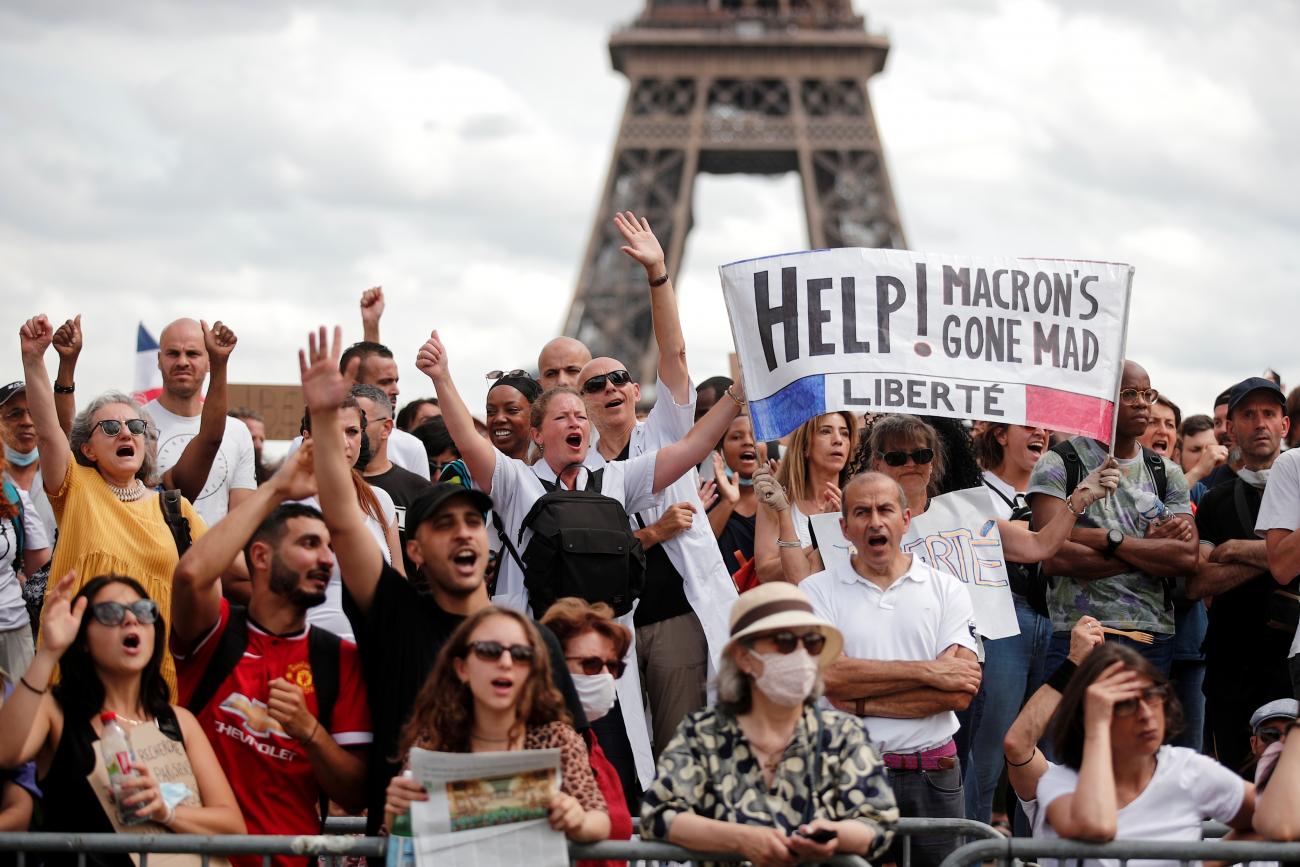 Protesters called to demonstrate by the French nationalist party "Les Patriotes" (the patriots) react against France's coronavirus restrictions, in Paris, France on July 24, 2021.