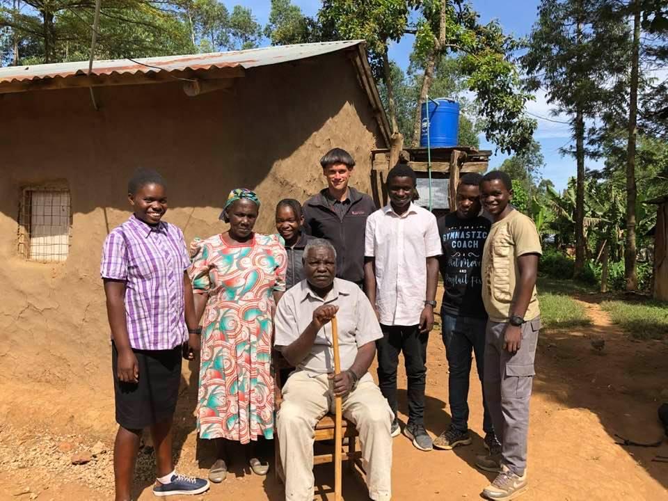 Charles Mushila Shibeka with his family before the COVID-19 pandemic .