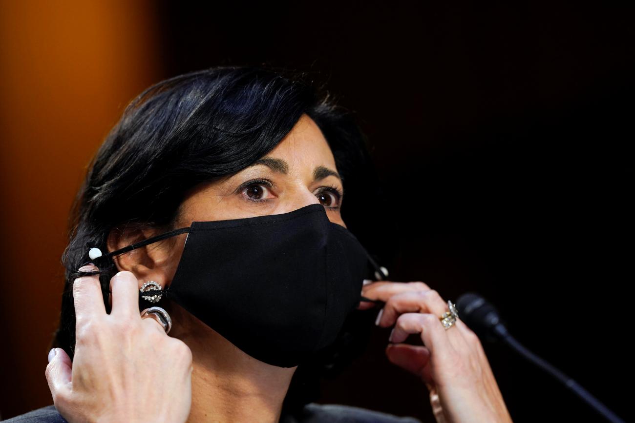 Dr. Rochelle Walensky, Director of the Centers for Disease Control and Prevention adjusts her face mask during a U.S. Senate Health, Education, Labor and Pensions Committee hearing to examine the COVID-19 response, focusing on an update from federal officials, on Capitol Hill in Washington, U.S., March 18, 2021