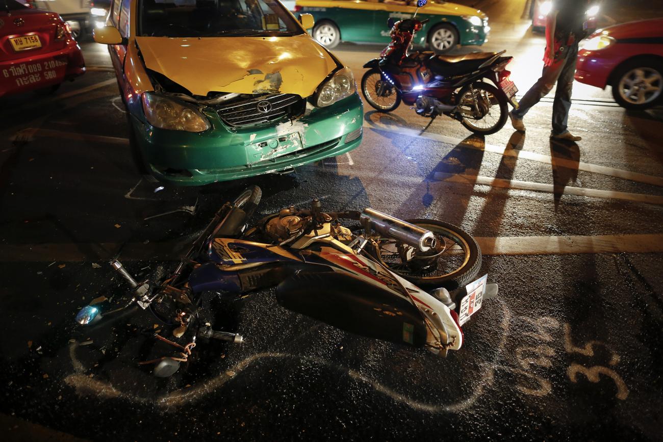 The positions of colliding vehicles are marked at the site of a road accident during the Songkran festival in Bangkok late April 13, 2013. 