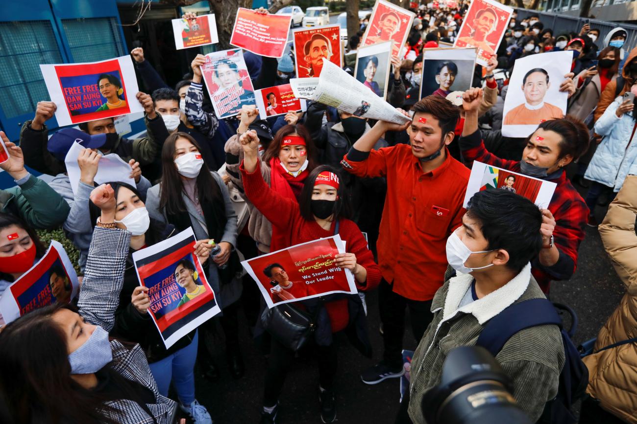 Protesters from Myanmar living in Japan hold portraits of leader Aung San Suu Kyi and Myanmar's President Win Myint at a rally against Myanmar's military after it seized power from a democratically-elected civilian government and arrested the duo, outside Foreign Ministry in Tokyo, Japan, on February 3, 2021.