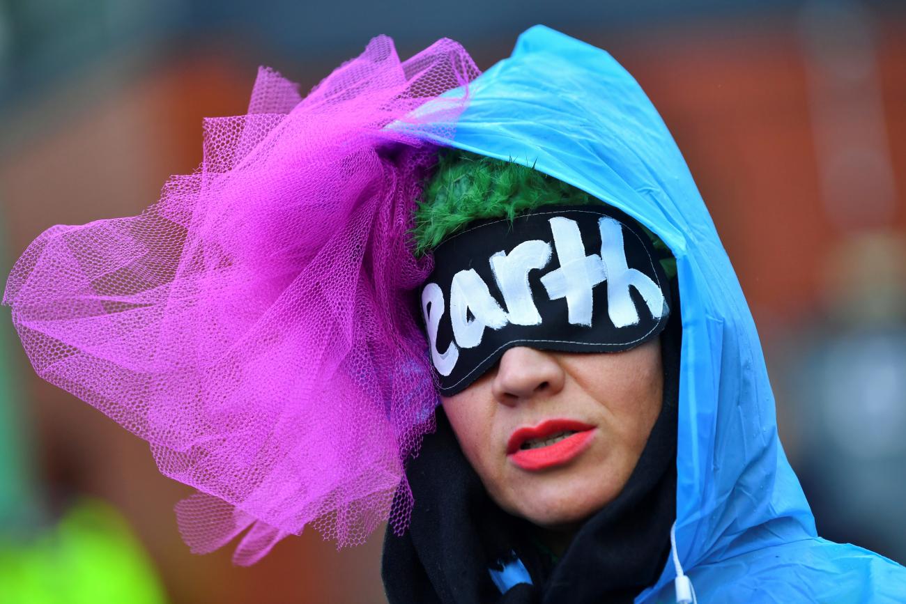 A person demonstrates near the UN Climate Change Conference (COP26) venue, in Glasgow, Scotland, on November 12, 2021.