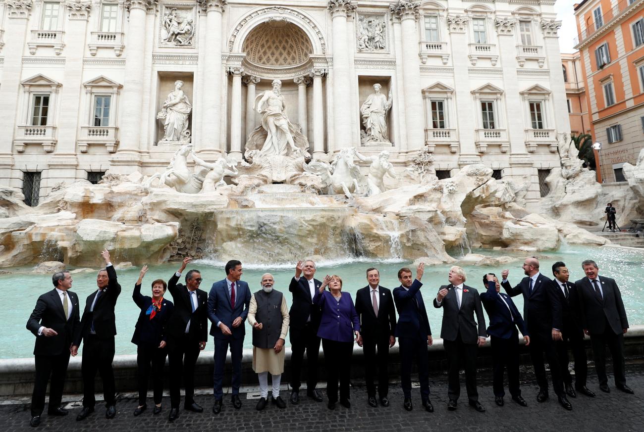 World leaders toss a coin into Rome's iconic Trevi Fountain on the sidelines of the G20 Summit in Rome, Italy, on October 31, 2021. 