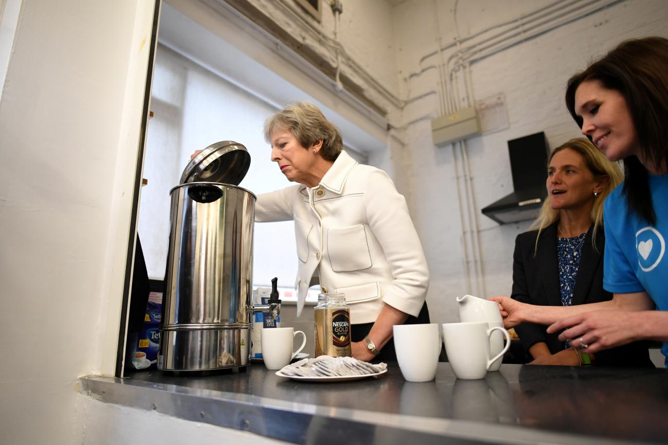 Prime Minister Theresa May attends a meeting at a charity working to combat loneliness, in London, England, on October 15, 2018.