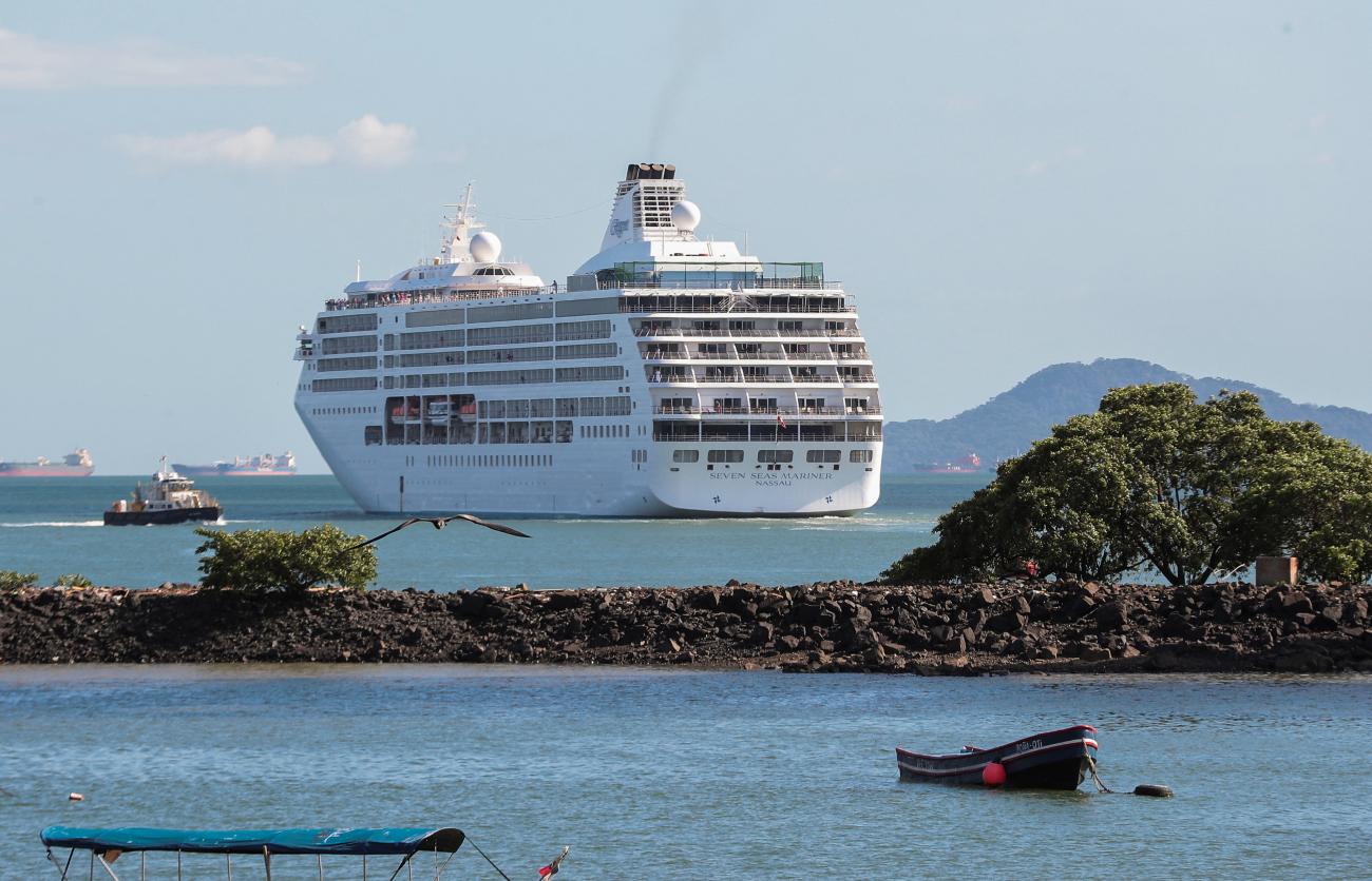 DOCUMENT DATE: December 23, 2021 The "Seven Seas Mariner" cruise ship traveling from Florida passes through the Panama Canal after it was barred from docking by local authorities in Cartagena, Colombia, on Wednesday due to COVID-19 infections on board, on the outskirts of Panama City, Panama December 23, 2021.