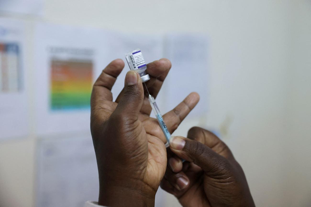 A health worker prepares a dose of Pfizer/BioNTech's COVID-19 vaccine at the Penda Medical Centre in Nairobi, Kenya, December 9, 2021.