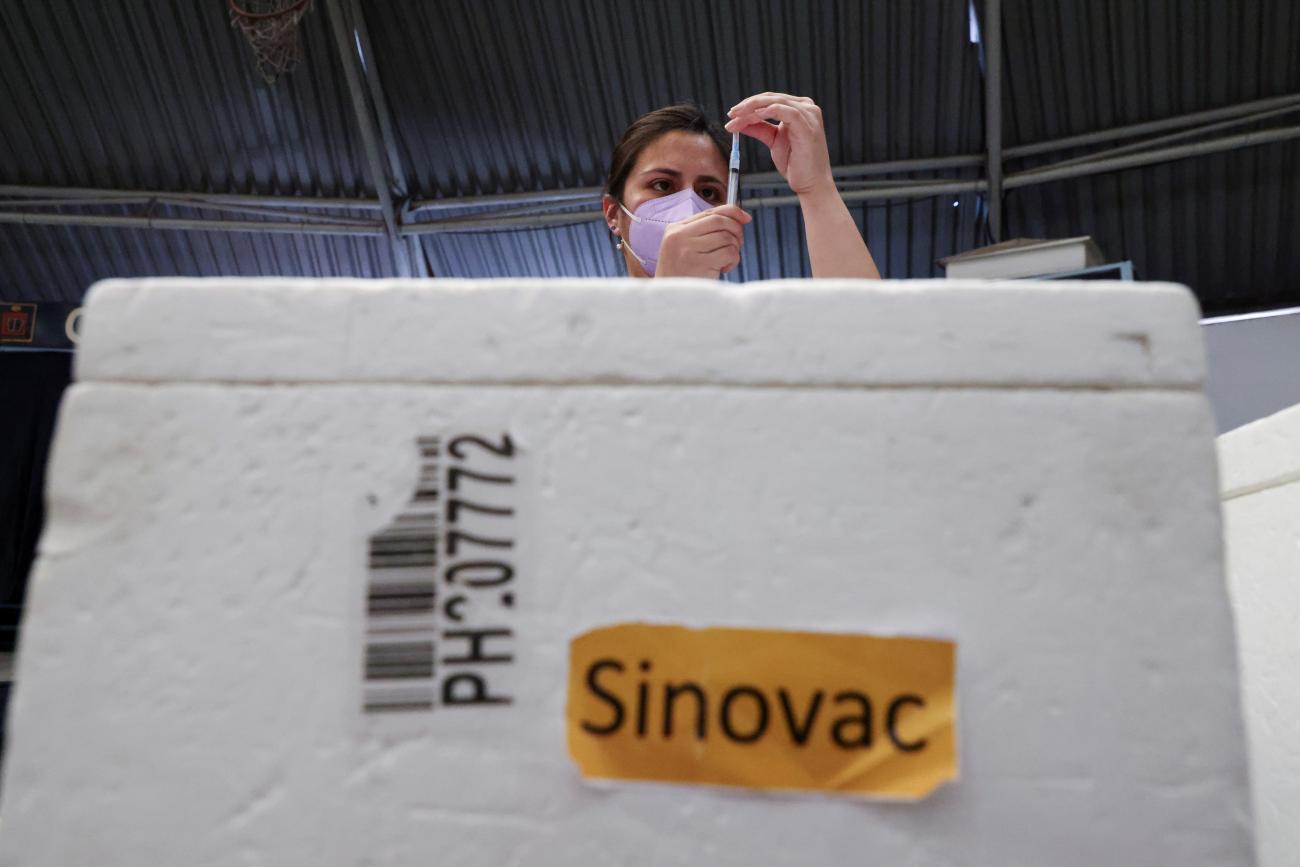A health-care worker prepares a dose of Sinovac's CoronaVac vaccine as Chilean health authorities continue a COVID-19 vaccination campaign for 6- to 11-year-olds, in Santiago, Chile.